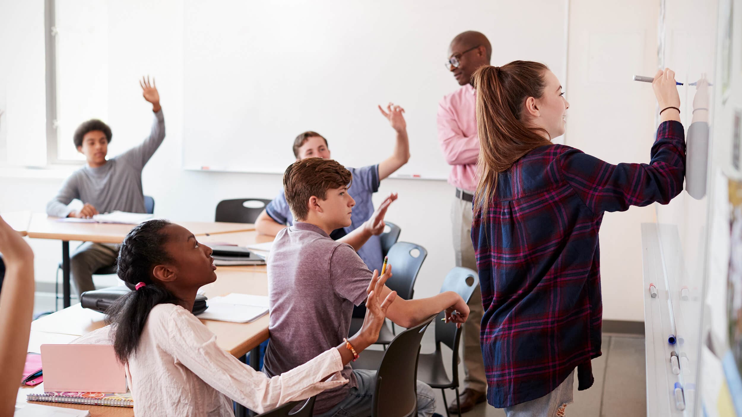 A level student at white board
